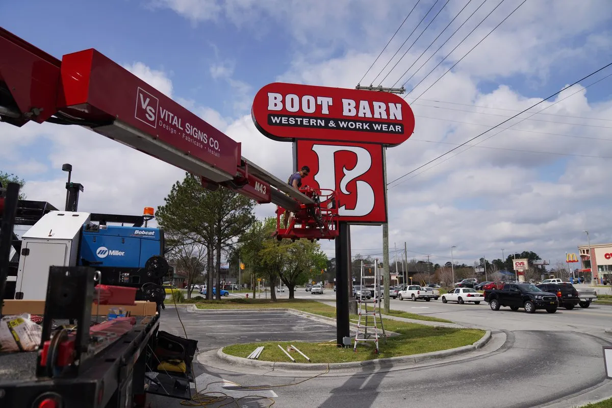 Boot Barn pole sign installation
