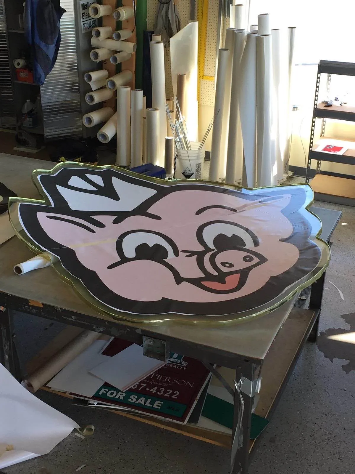 Custom shaped dimensional sign