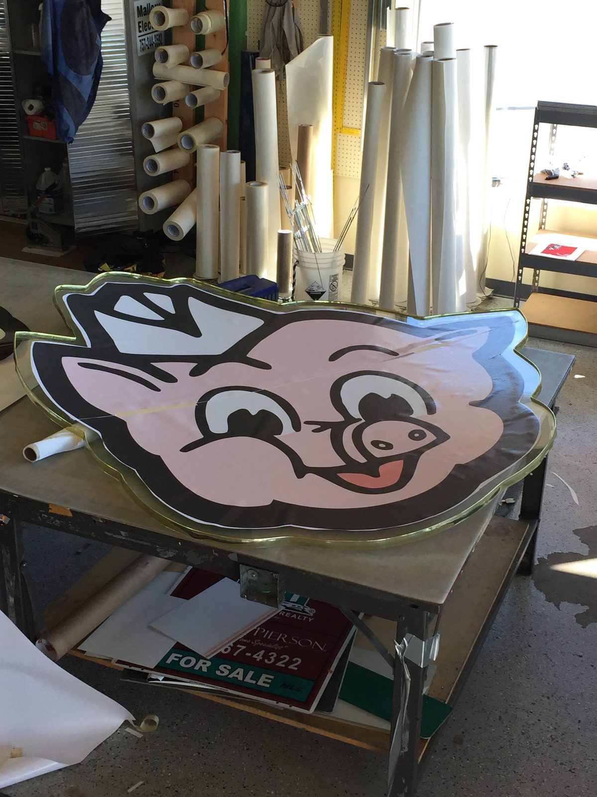 Custom shaped dimensional sign
