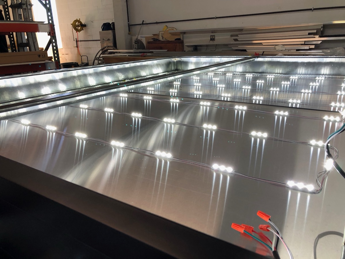 Boom truck for sign installation