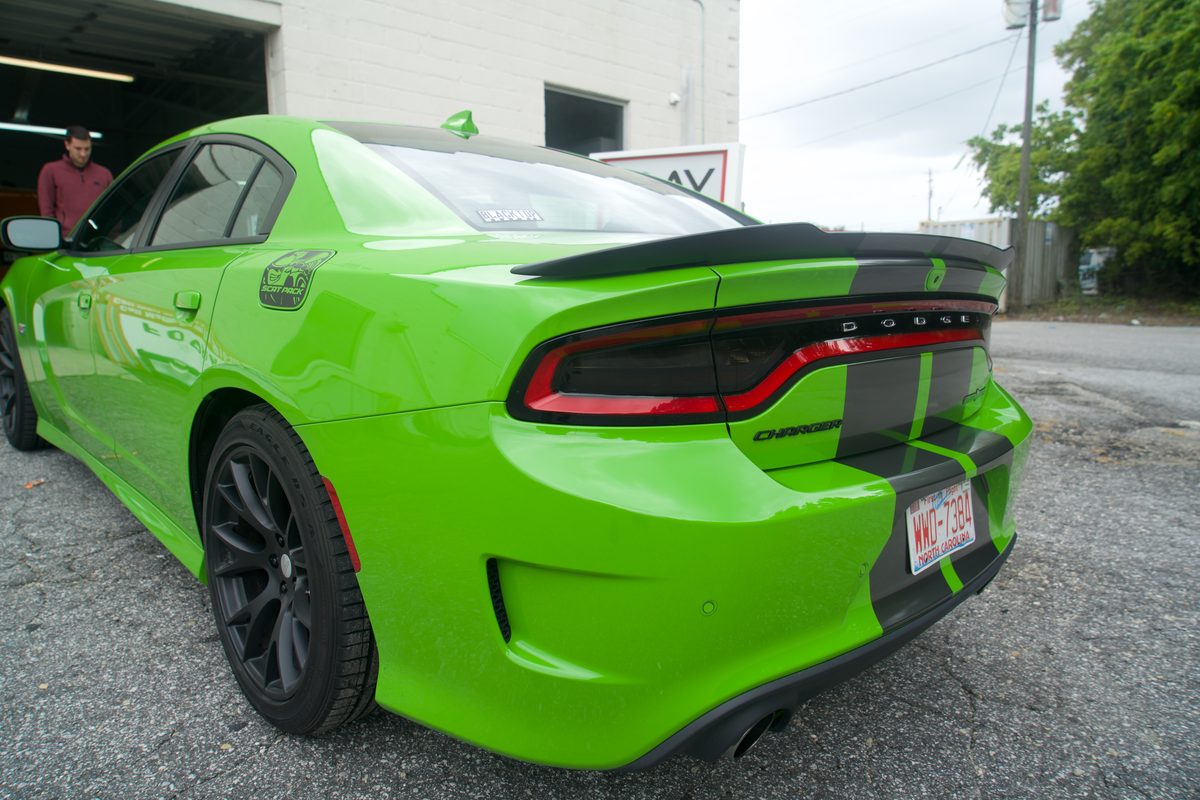 Green Dodge Charger racing stripes